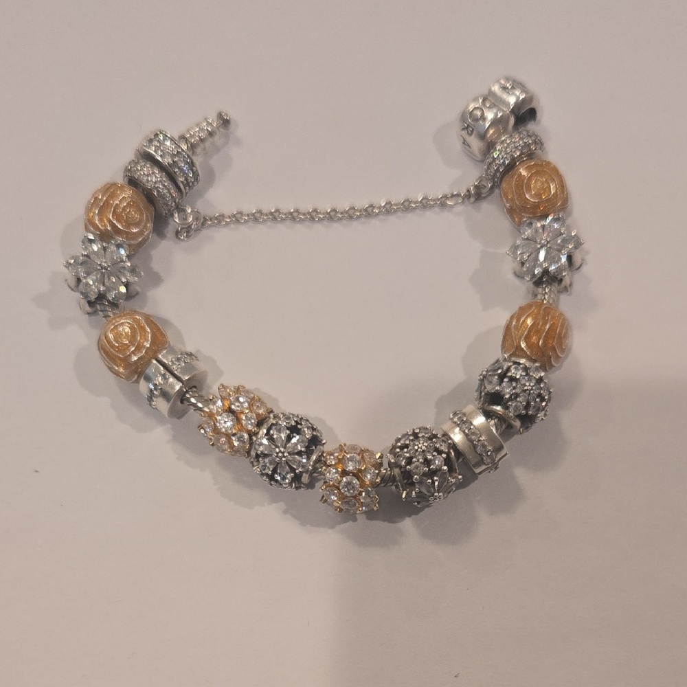 Elegant Silver and Gold Charm Bracelet